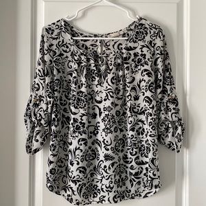 Black and white floral blouse.